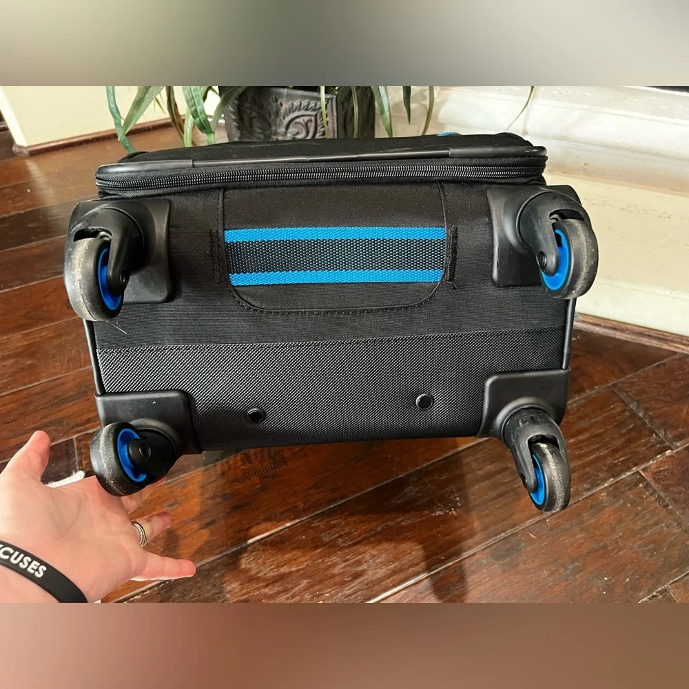 American Tourister Black and Blue Carry-On Spinner Suitcase